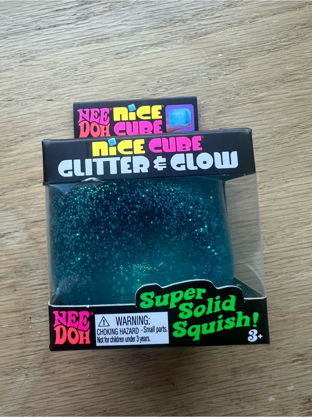 Nee Doh Nice Cube Glitter & Glow Super Solid Squish - Teal Glitter